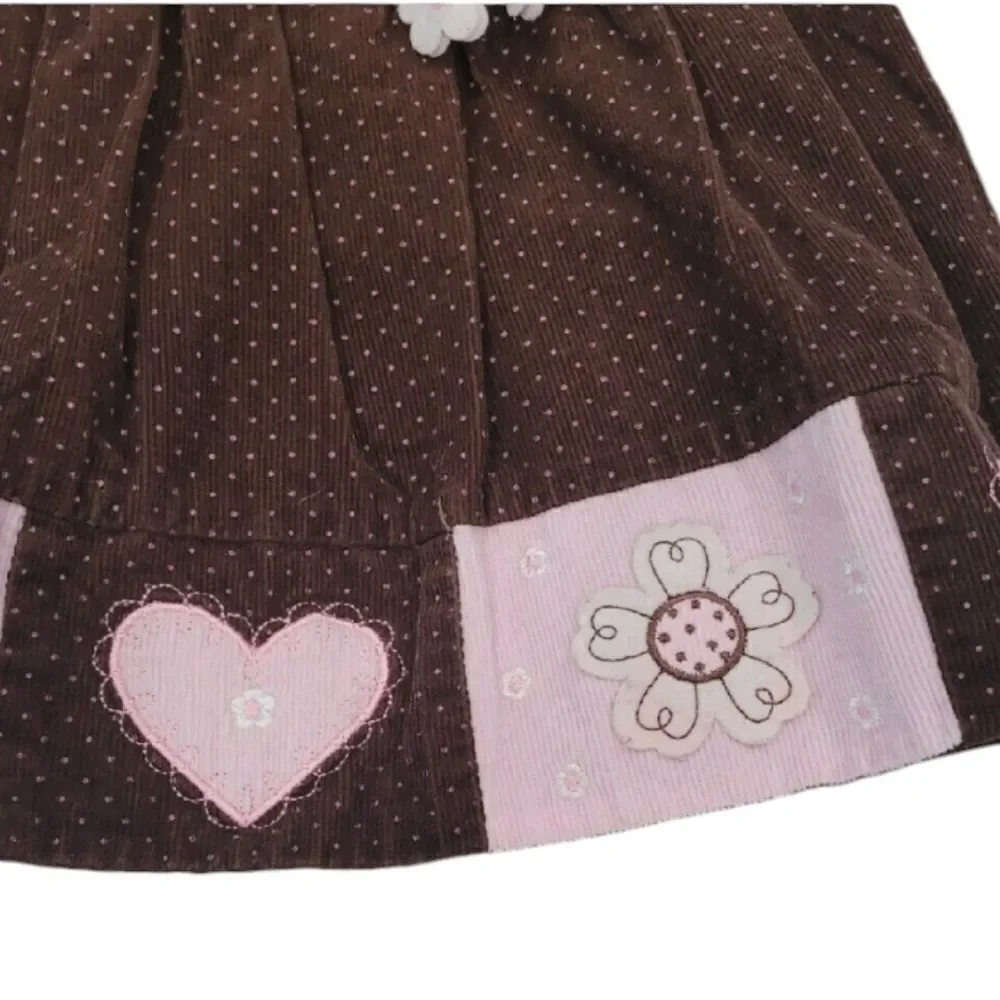 Corduroy overall dress with pink hearts
